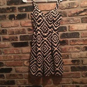 Sleeveless aline dress with a daring neckline